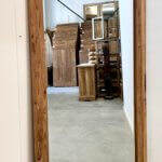 Grote spiegel met teakhouten lijst