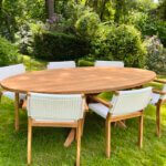 Prachtige set met een ovale tuintafel en 6 tuinstoelen met wicker